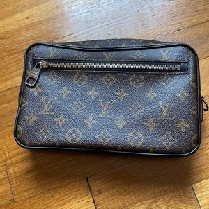 Louis Vuitton wristlet.